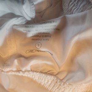 White reebok microfiber shorts large